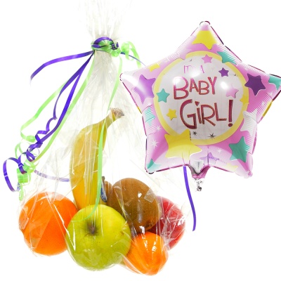 Zak fruit met geboorte ballon dochter